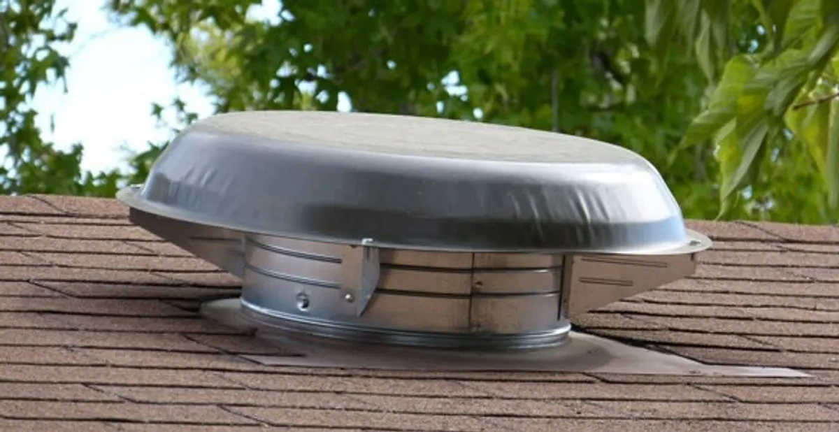 attic fan installation services with low-profile roof ventilation unit in Glendale, AZ