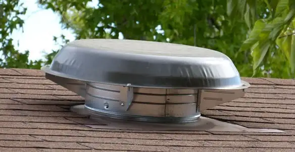 attic fan installation services with low-profile roof ventilation unit in Glendale, AZ