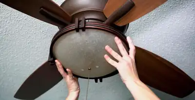 Ceiling fan repair and reinstallation on ceiling mount in Glendale, AZ