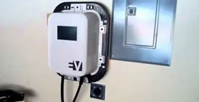 Electric car charger installation with wall-mounted EV charging station in Glendale, AZ