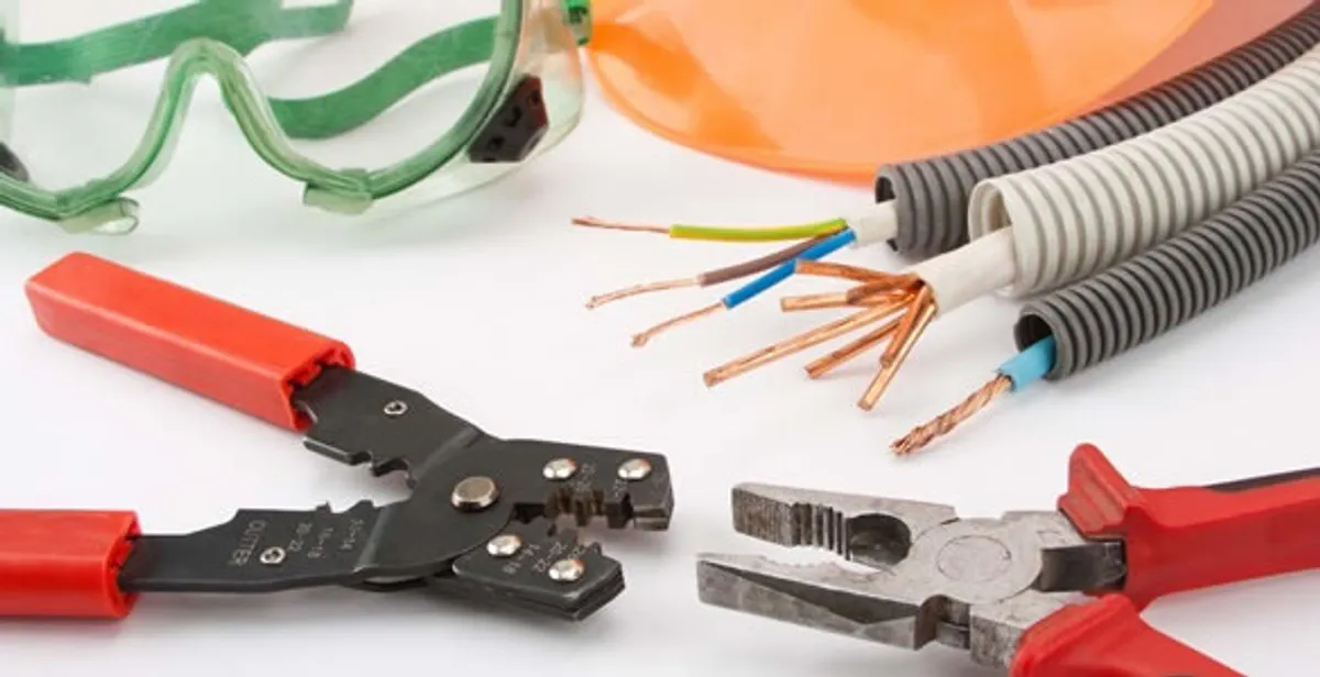 Electrical wiring repair with professional tools and safety equipment in El Mirage, AZ