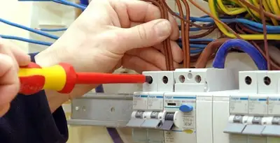 electrician services performing professional electrical panel wiring and connections in Glendale, AZ