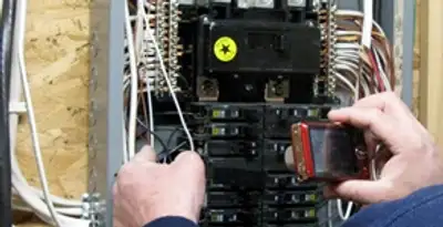 Home electrical inspection of circuit breaker panel by licensed electrician in Glendale, AZ
