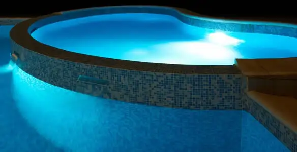 pool light installation and repair services highlighting illuminated pool interior lighting in Glendale, AZ
