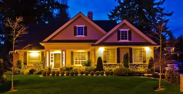 security light installation services illuminating a residential exterior at night in Glendale, AZ