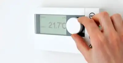 Thermostat installation service with professional adjusting temperature control in Glendale, AZ