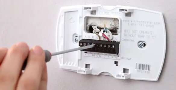 Thermostat installation service with proper wiring and secure wall mounting in Glendale, AZ