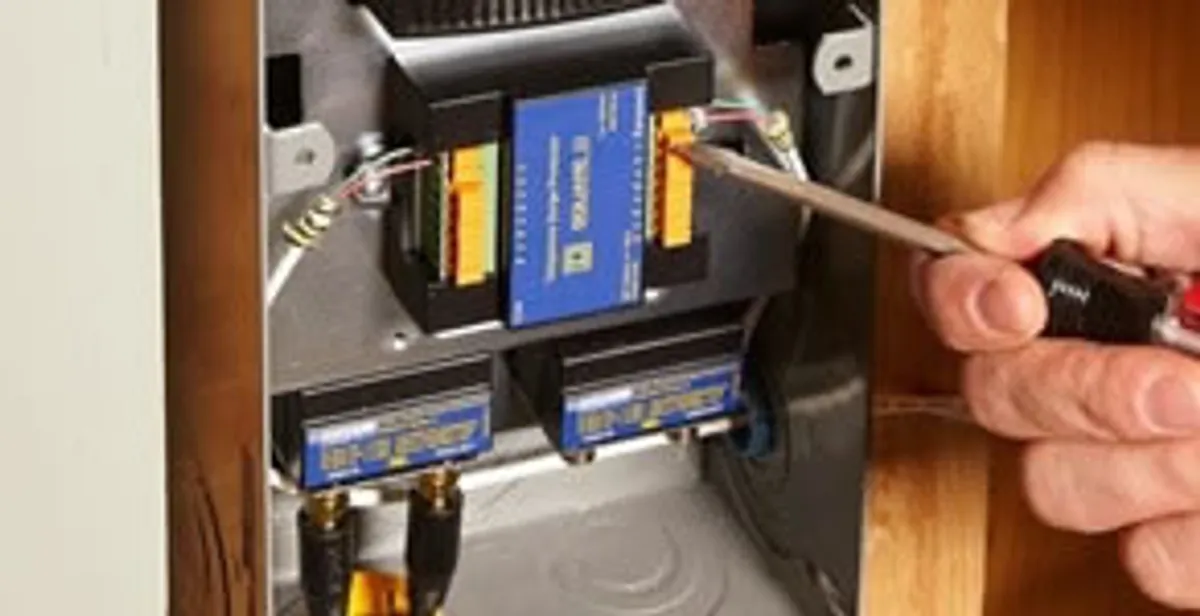 Whole home surge protection device being installed by a licensed electrician to protect electrical systems in Glendale, AZ