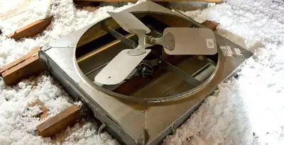whole house fan installation services with attic-mounted ventilation unit in Glendale, AZ
